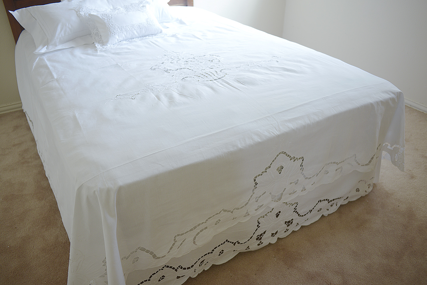 embroidered coverlet, dust ruffle